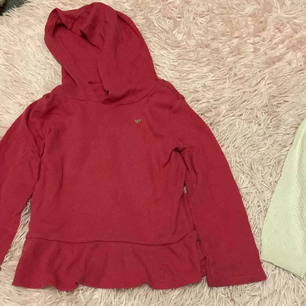 Pair of girls sweaters